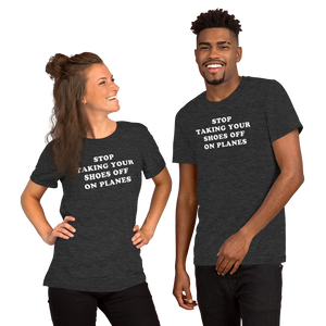 "Stop Taking Your Shoes Of On Planes" Tee - UNISEX